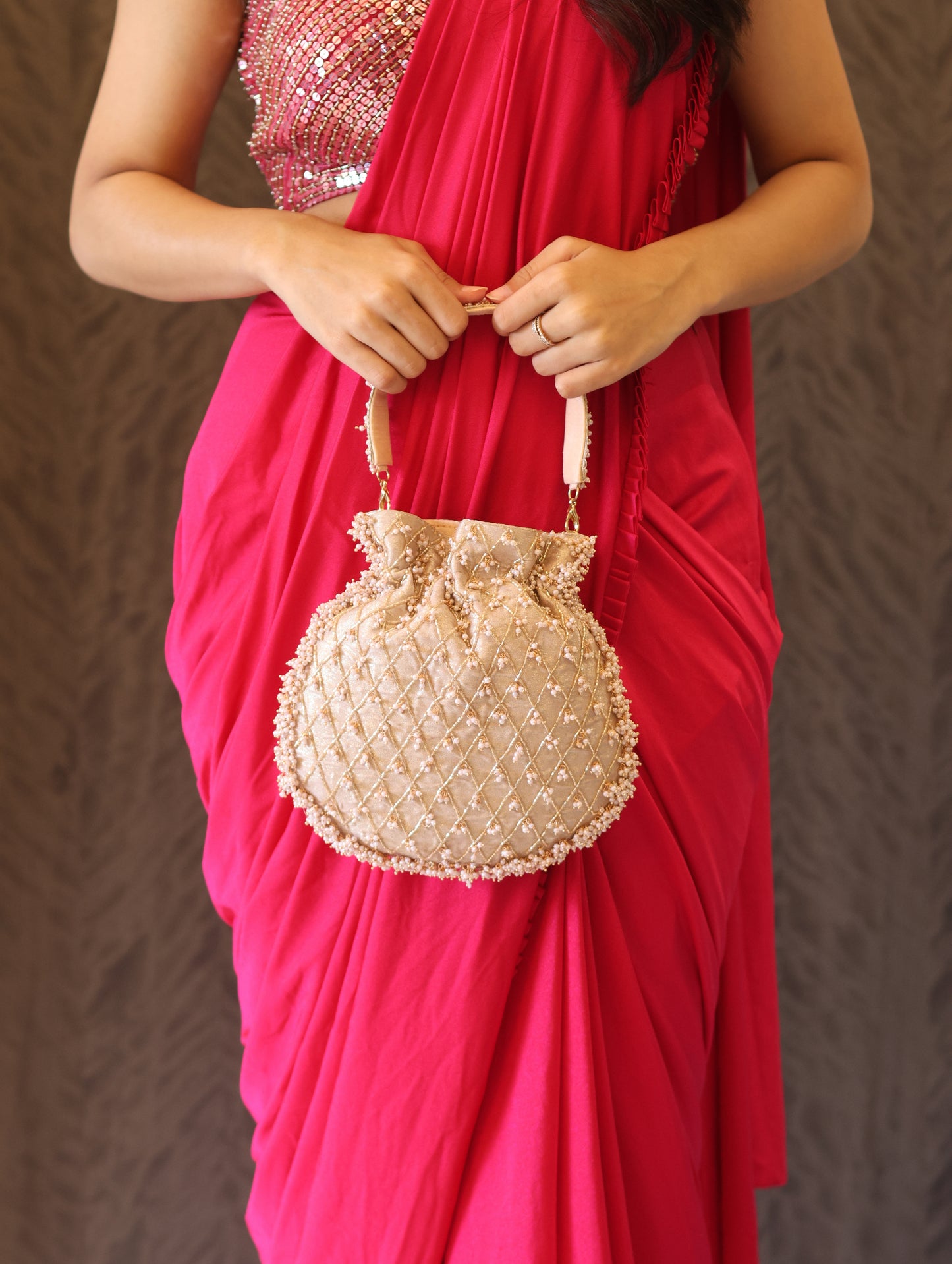 Pearl Essence Potli