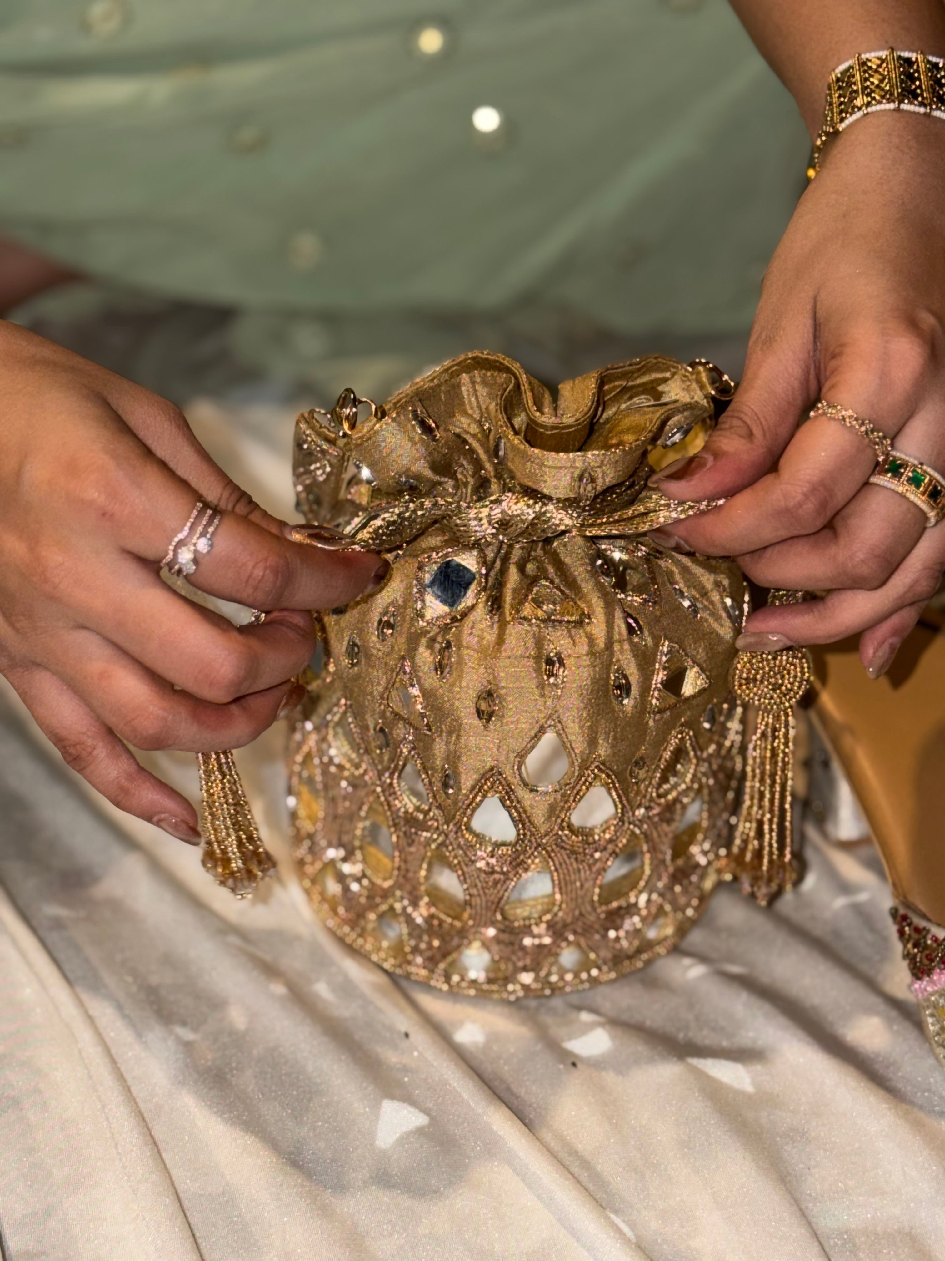 Dull Gold Raindrop Raw Silk Potli
