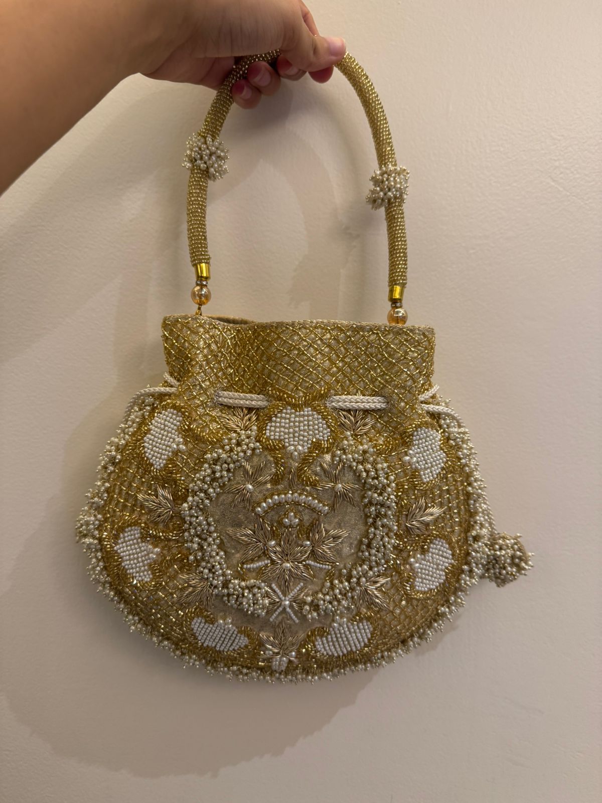 Tissue potli with zardosi & moti work